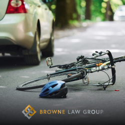 In the aftermath of a Goodyear bicycle accident, a bike helmet and bike lie on the ground